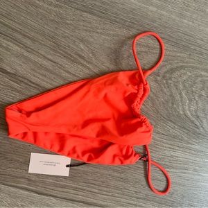 Bright orange very cheeky bikini bottoms